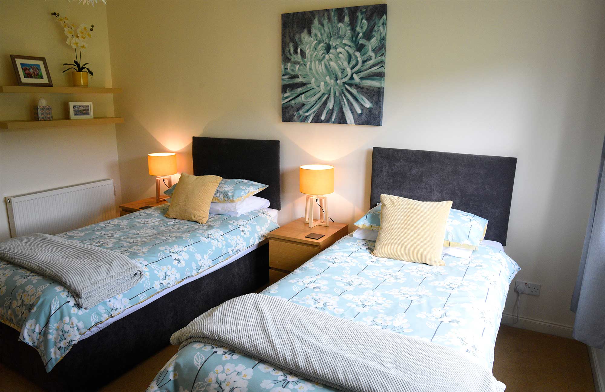 Our twin room with TV and private seating area